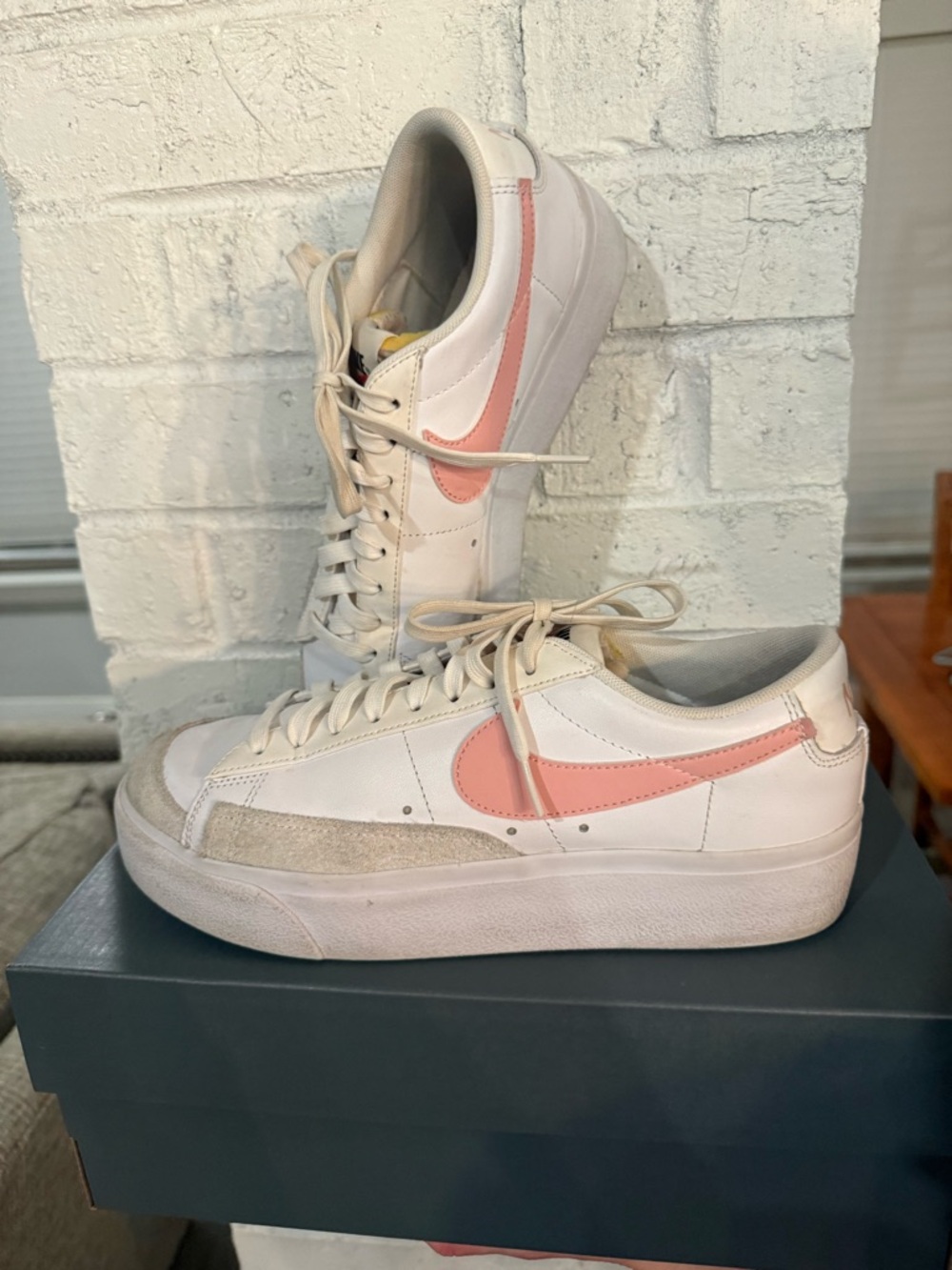 Nike White Low-Top Sneakers with Pink Swoosh